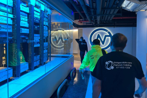 three cabling techs in data center