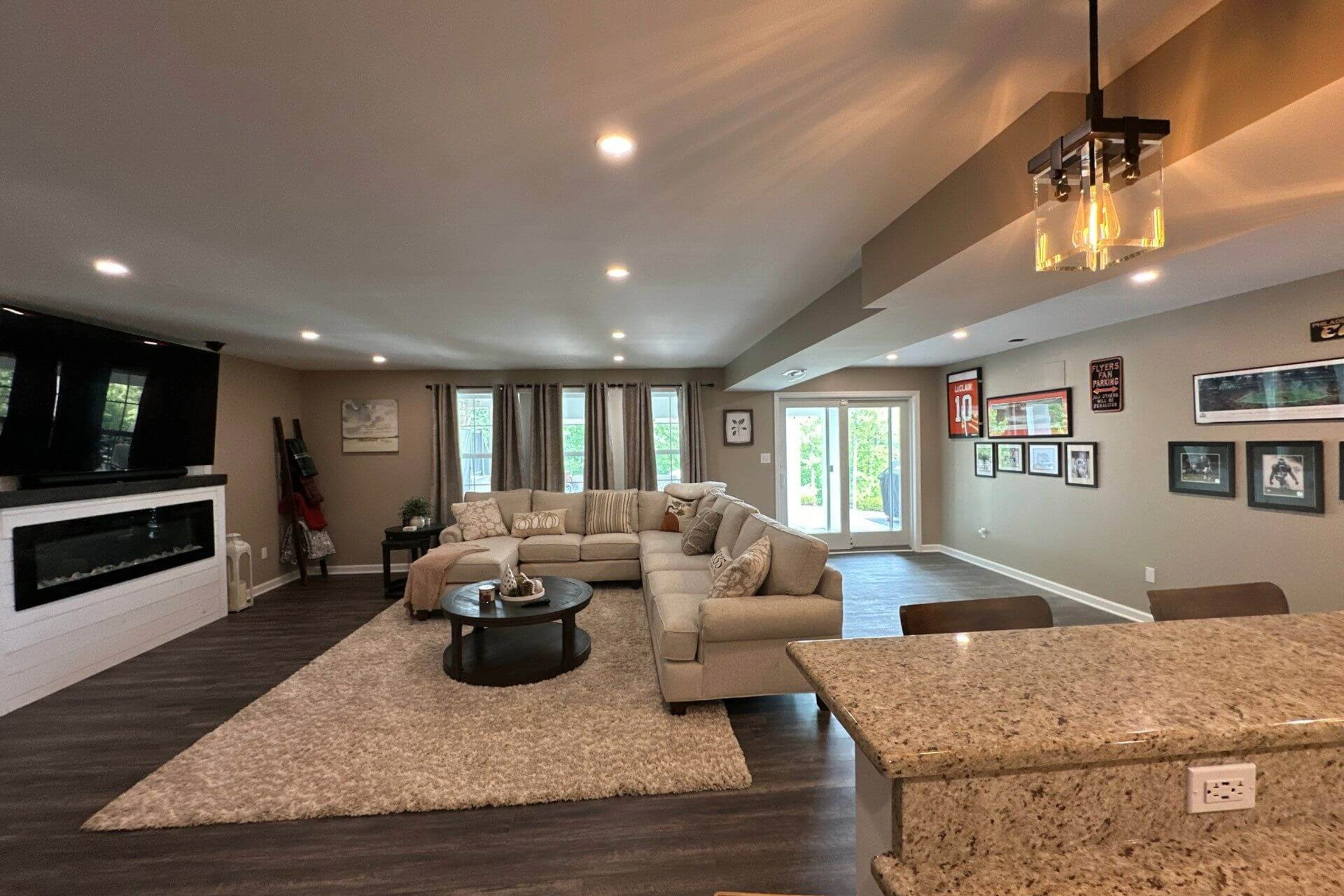 The living room and kitchen of a house.