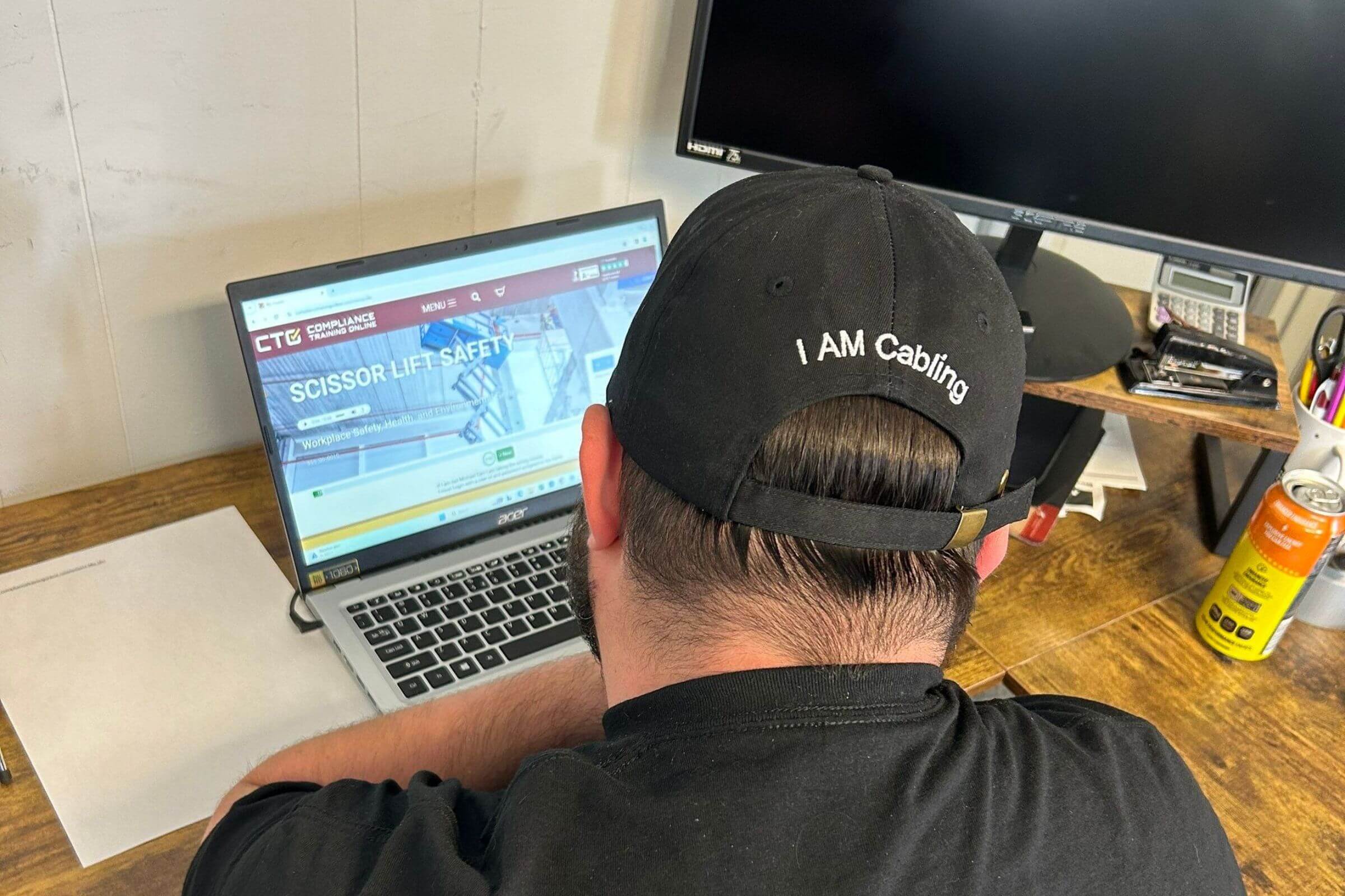 Technician completing scissor lift safety course