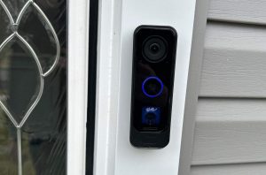a black front door security surveillance system