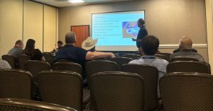 Presentation for Insights and Education in a room with professionals