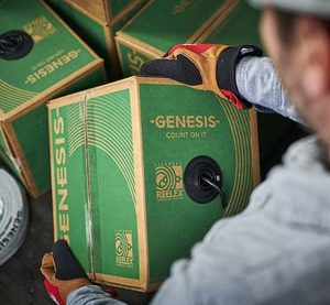 How to Read Genesis/Southwire Cable Part Numbers: A Complete Guide by Bridge Cable 2 Technician holding Genesis structured cabling reel box used for commercial network and low-voltage installations.