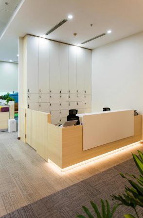 Smart Lockers and Access Control System Integration with Bridge Cable 4 Modern office smart lockers with secure access control system for employee storage, workplace security, and organized commercial office management.