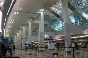 RF Interference Challenges During Network Cabling Installs Near Major Airports Like Philadelphia International 3 Interior check-in area at Philadelphia International Airport with high ceilings, lighting systems, and passenger service counters.